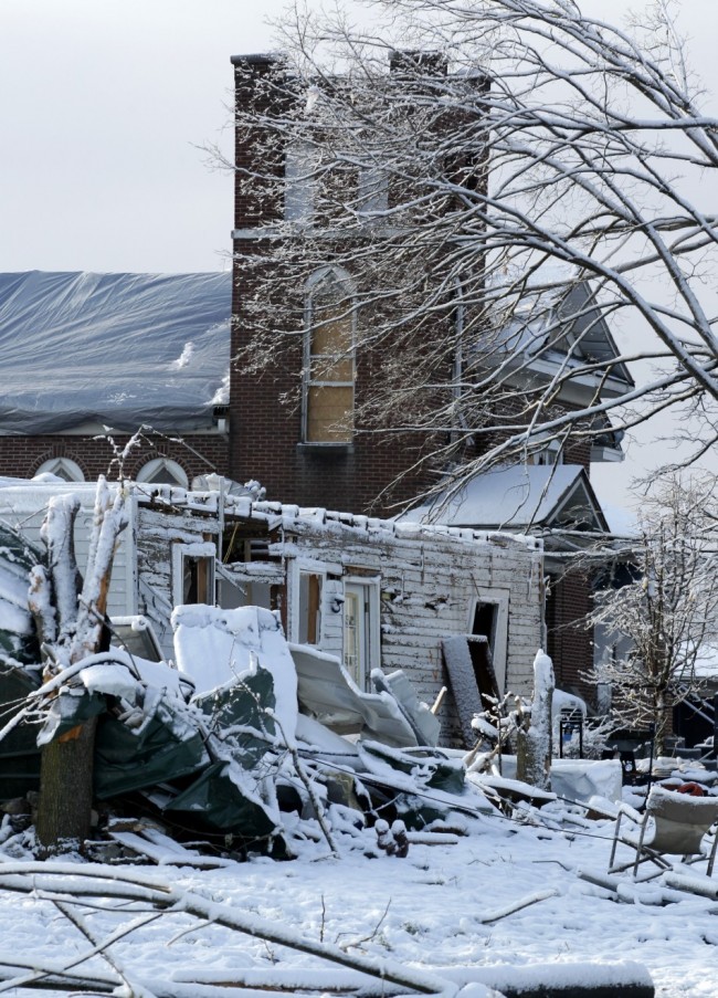 2012 Indiana Tornadoes Aftermath: Snow Covers Damaged Homes, Debris